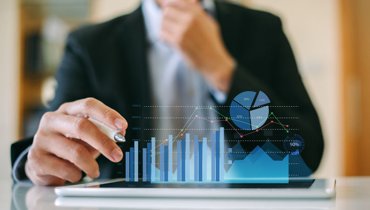 Businessman investor analyzing company financial mutual fund report working with digital augmented reality graphics technology. Concept for business, economy and marketing.